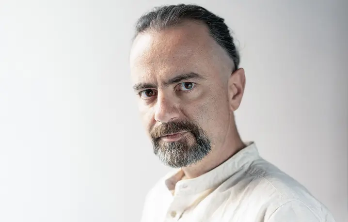 Michał Kuźmiński, dziennikarz Tygodnika Powszechnego